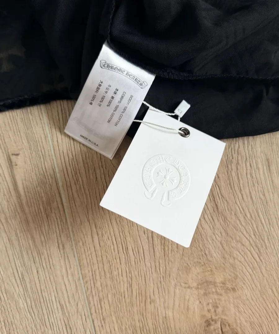 Ярлык с информацией о составе платья Chrome Hearts