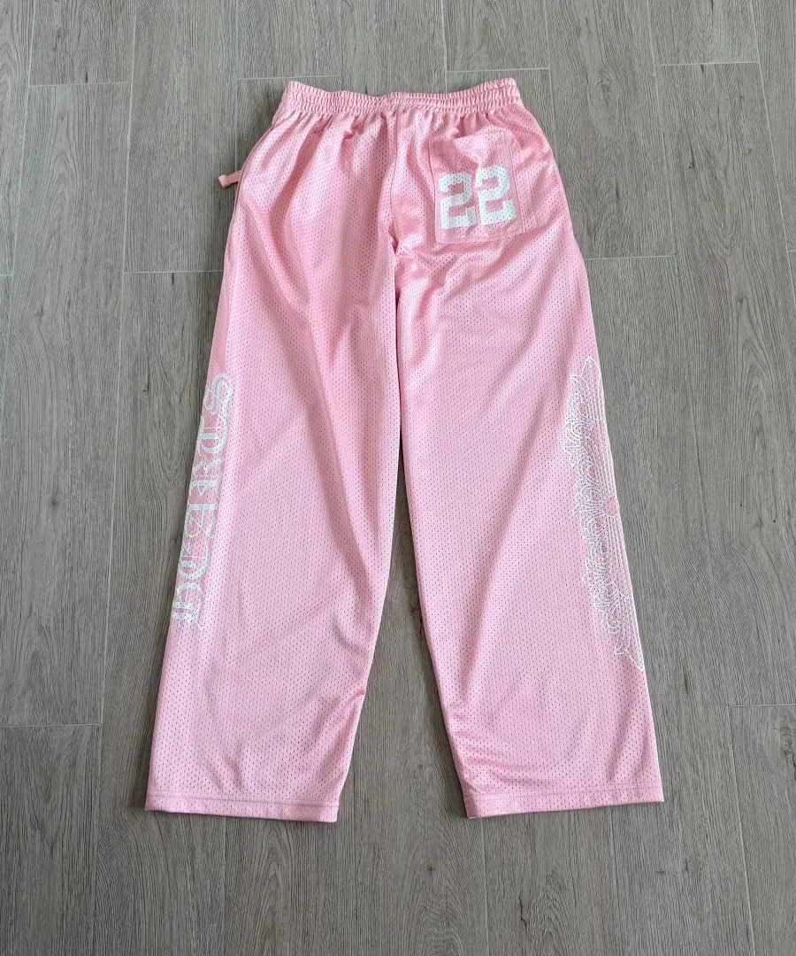 Розовые спортивные штаны Chrome Hearts, вид сзади