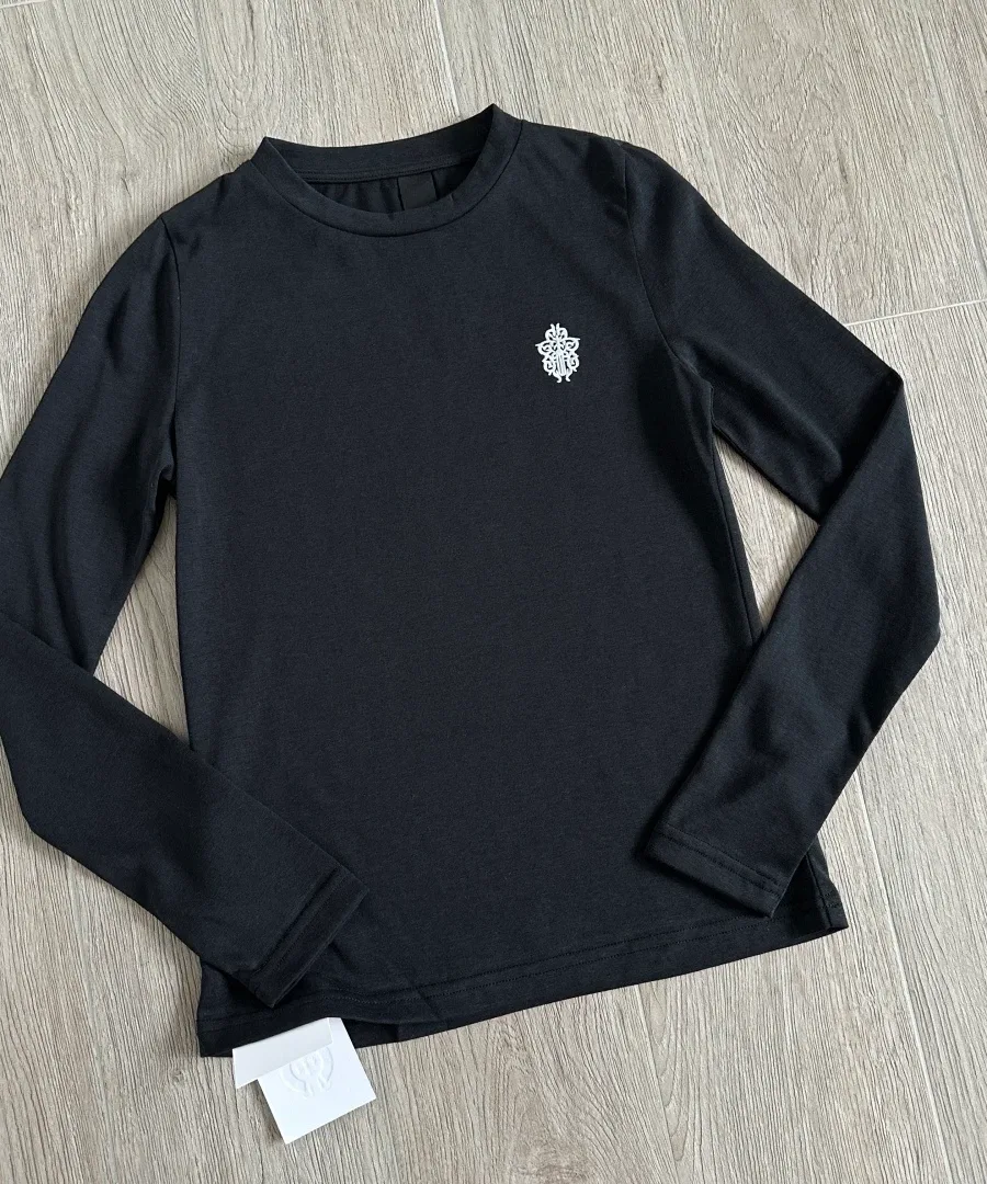 Женский лонгслив Chrome Hearts GRP Y черного цвета, вид спереди на плоскости
