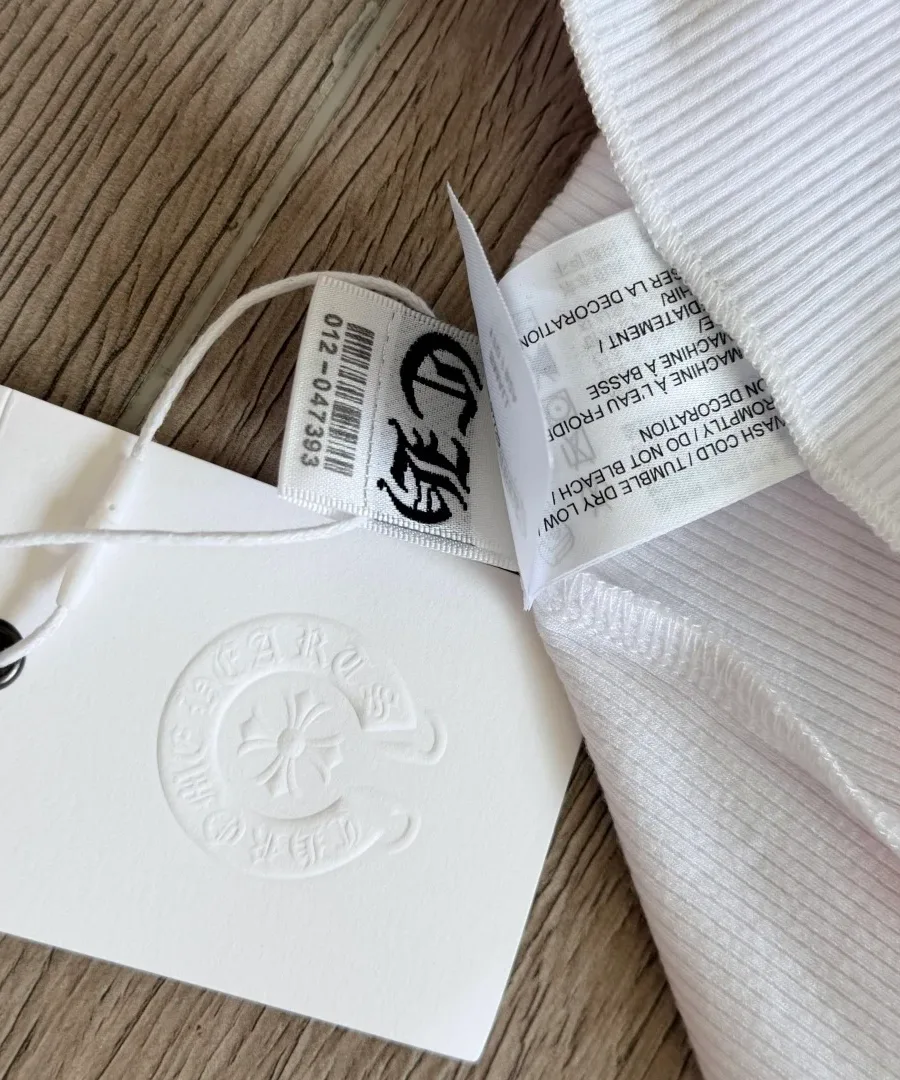 Фирменная бирка белого платья Chrome Hearts