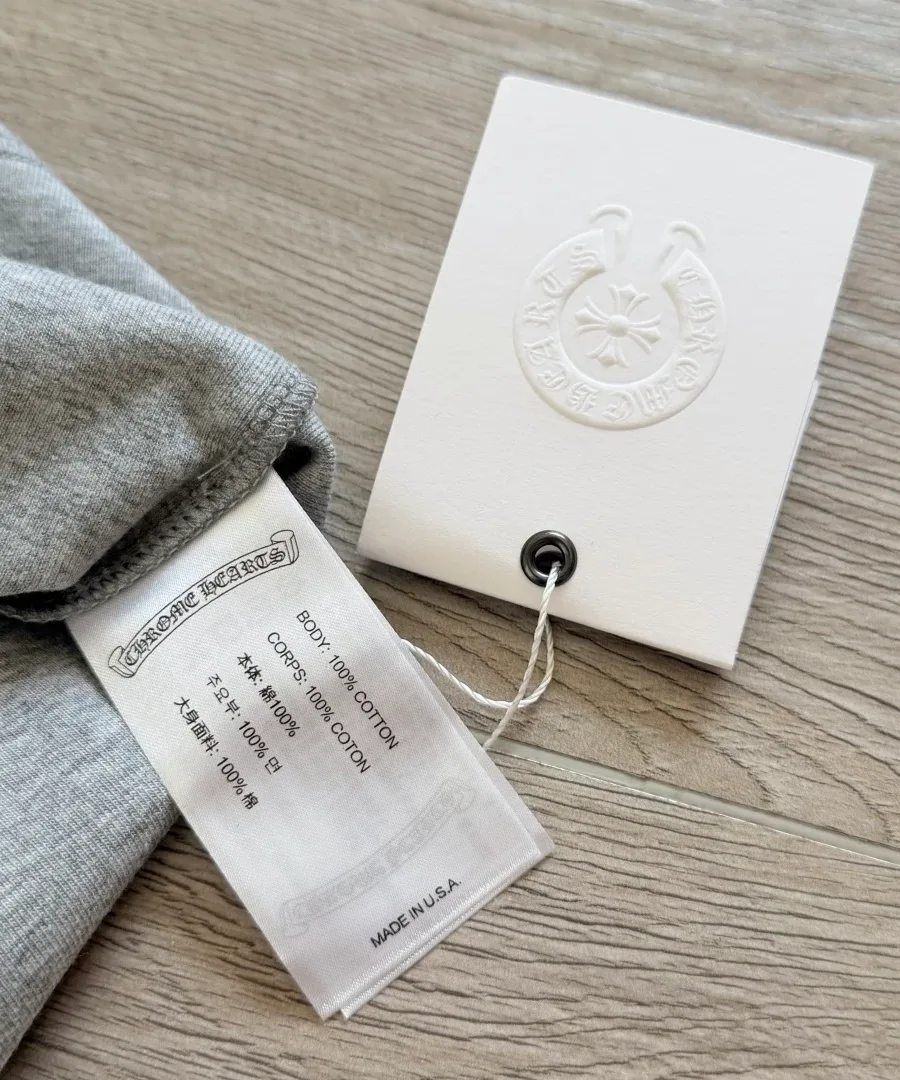 Внутренняя бирка с составом 100% хлопок серого платья Chrome Hearts