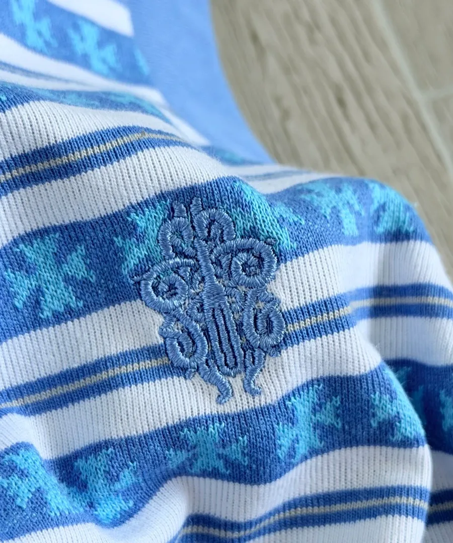 Фактурная вышивка в виде креста на трикотаже Chrome Hearts