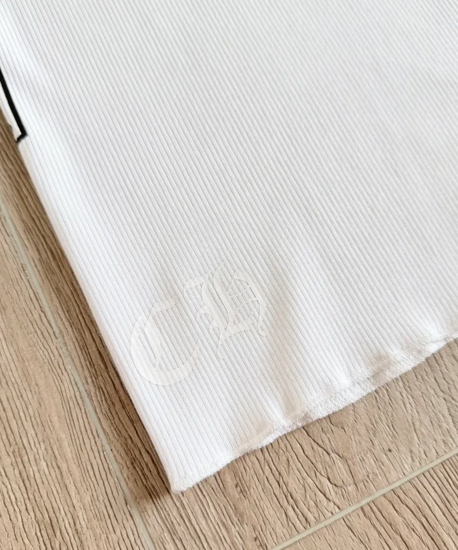 Деталь нижнего подгиба платья-майки Chrome Hearts