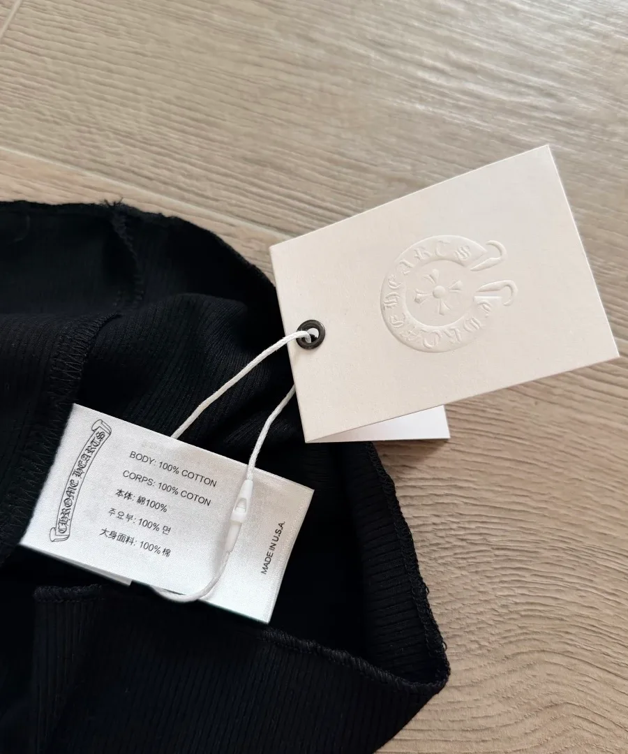 Ярлык с составом ткани черного платья-майки Chrome Hearts