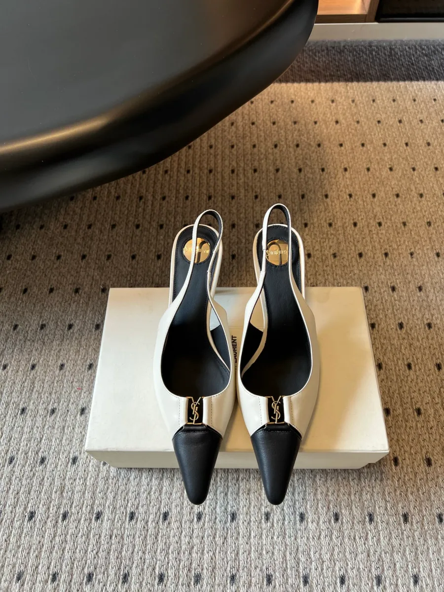 Бело-чёрные слингбэки Saint Laurent с контрастным мысом