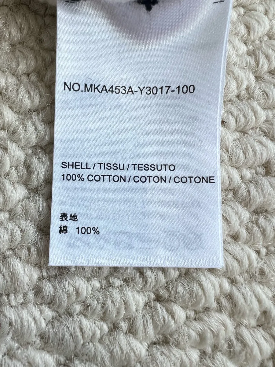Вшивной ярлык с артикулом и составом из 100% хлопка