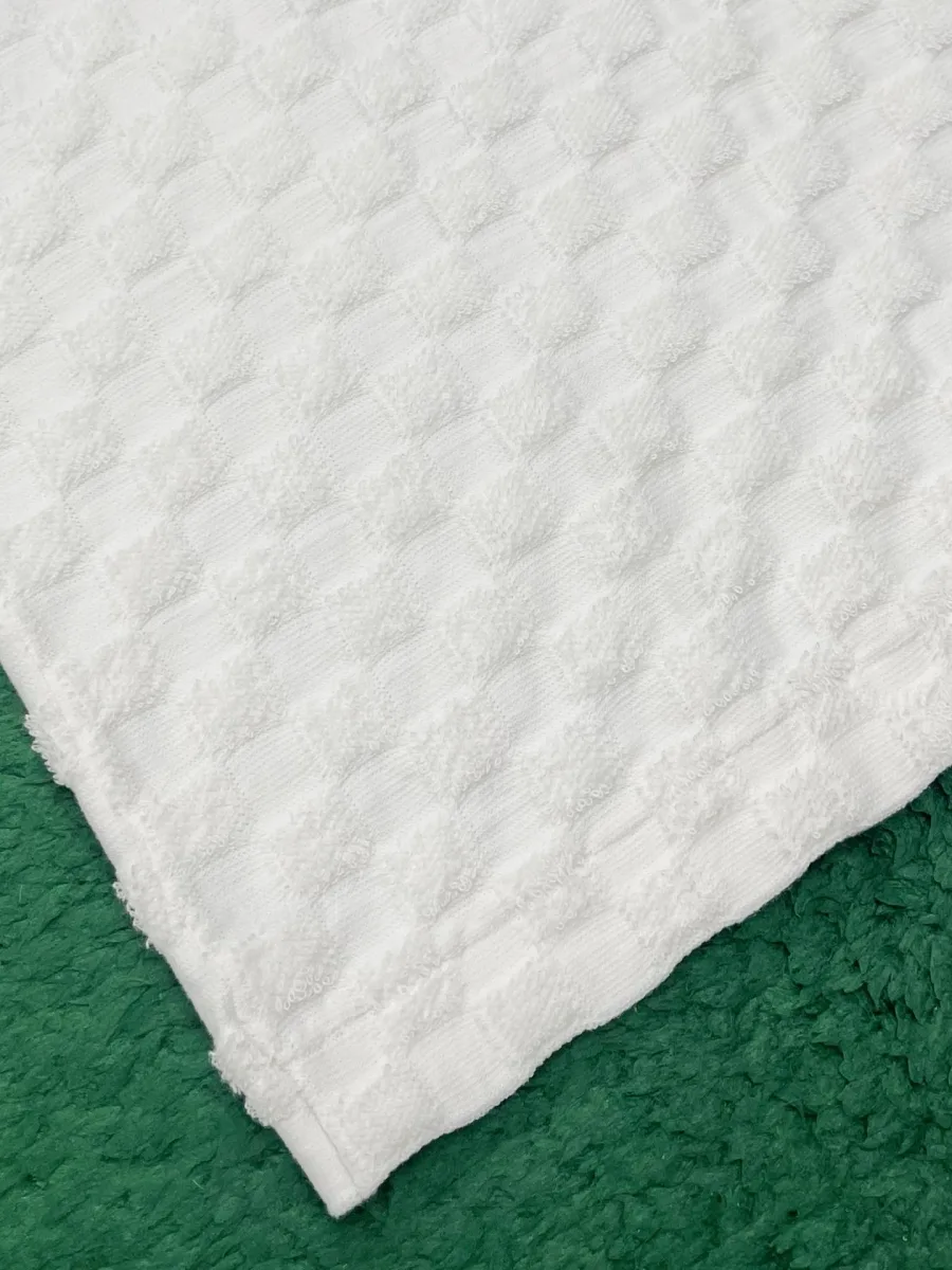 Нижний край футболки с рельефным шахматным узором Damier