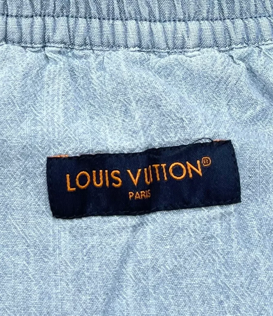 Фирменная тканевая бирка Louis Vuitton Paris на поясе