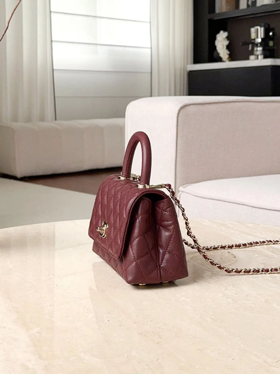 Бордовая сумка Chanel Coco Handle Mini, вид сбоку