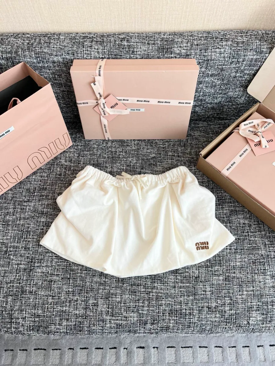 Белая хлопковая мини-юбка Miu Miu силуэта баллон