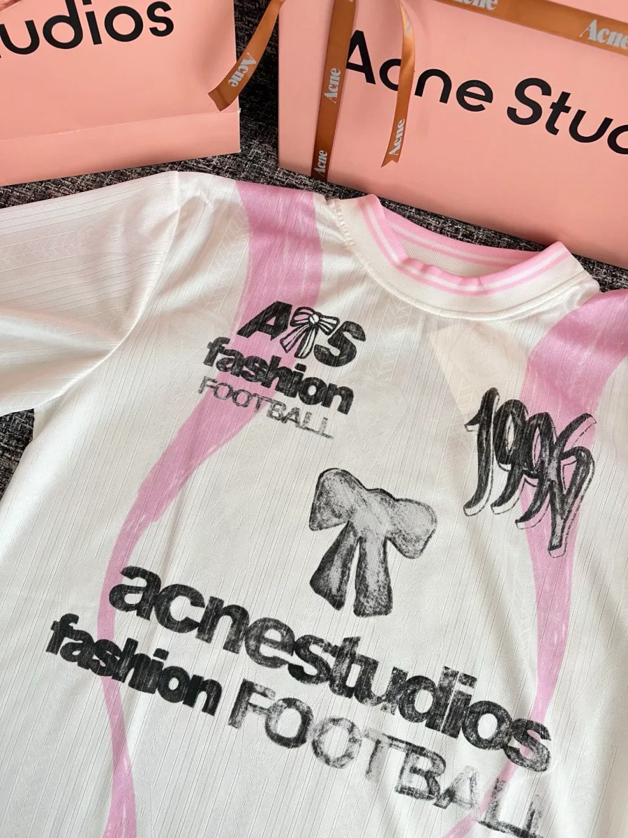 Принты с надписью Acnestudios fashion Football и бантом на груди лонгслива
