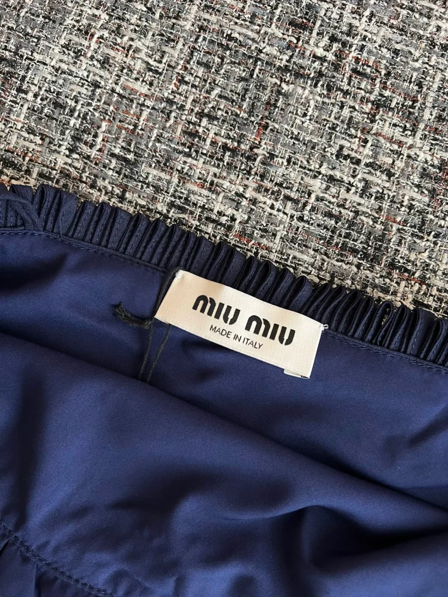 Вшитая текстильная бирка Miu Miu Made in Italy