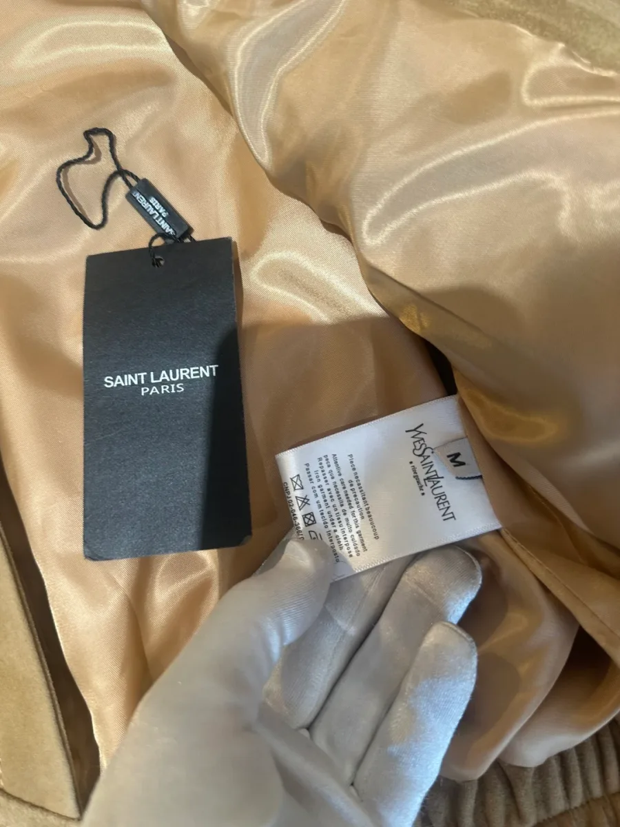 Бирка Saint Laurent и ярлык с составом на внутренней стороне куртки