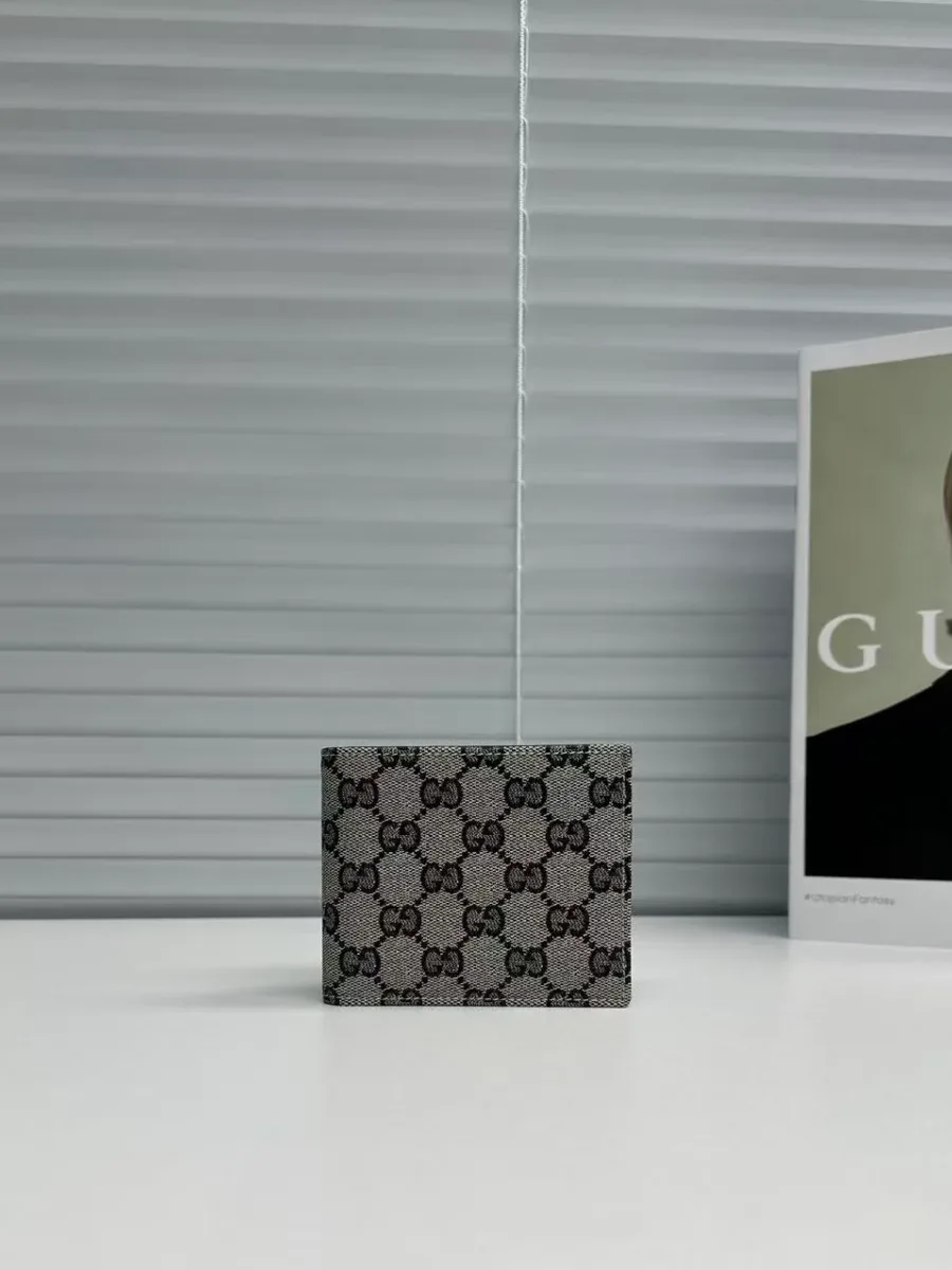 Синий складной кошелёк Gucci с монограммой GG, вид спереди