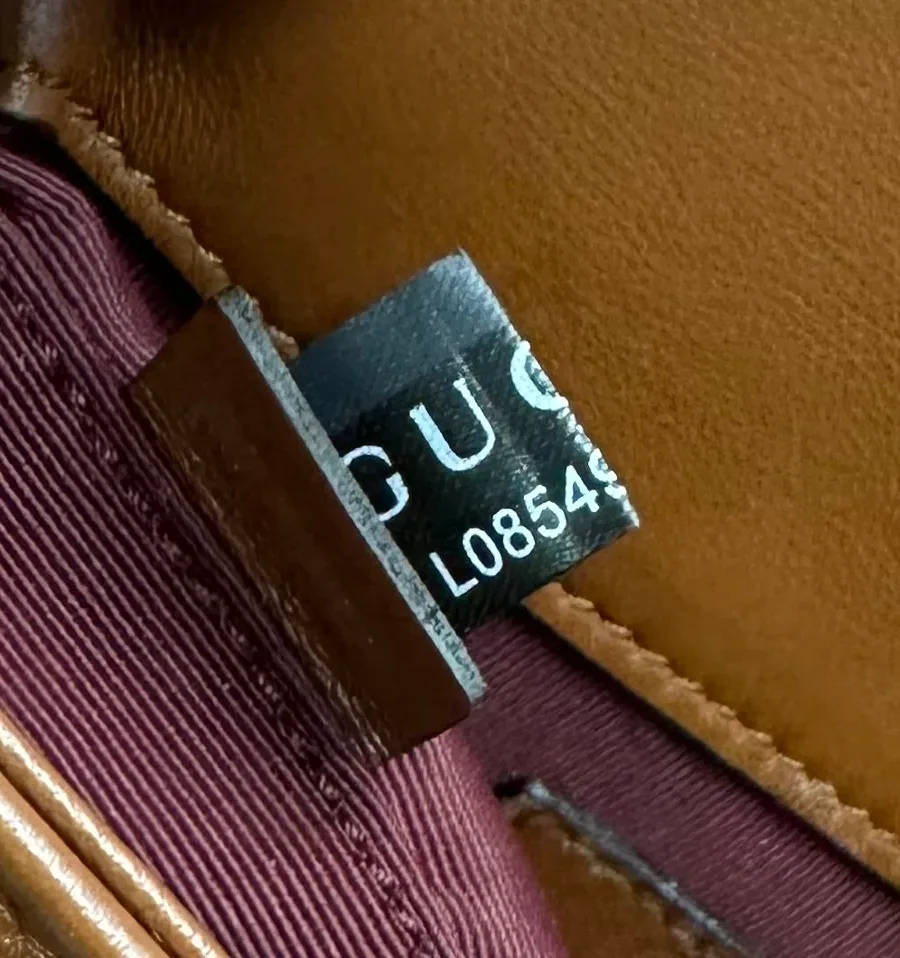 Вшитый тканевый ярлык с логотипом Gucci