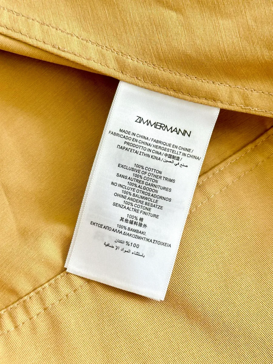 Внутренняя бирка с составом ткани 100% хлопок и логотипом Zimmermann