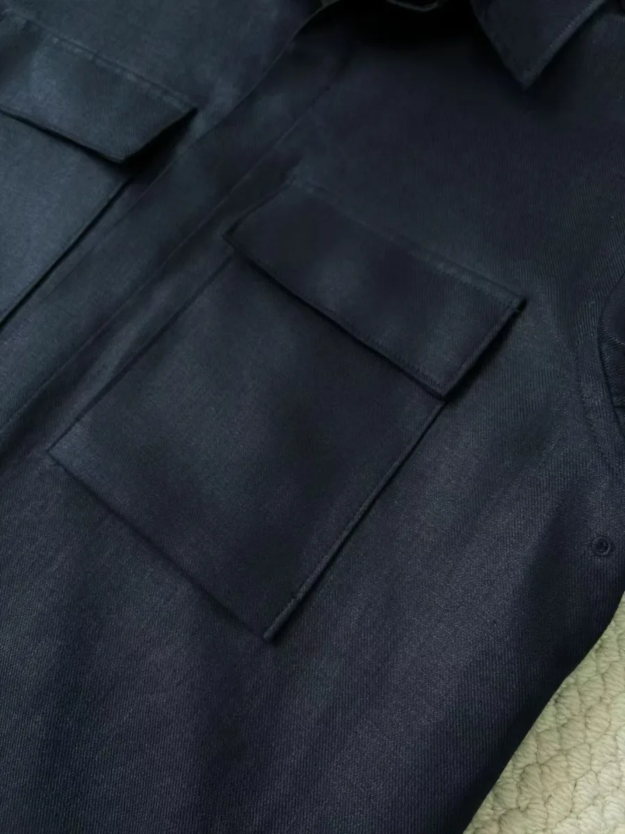 Рубашка Zegna на модели в ракурсе три четверти, видны воротник и нагрудные карманы