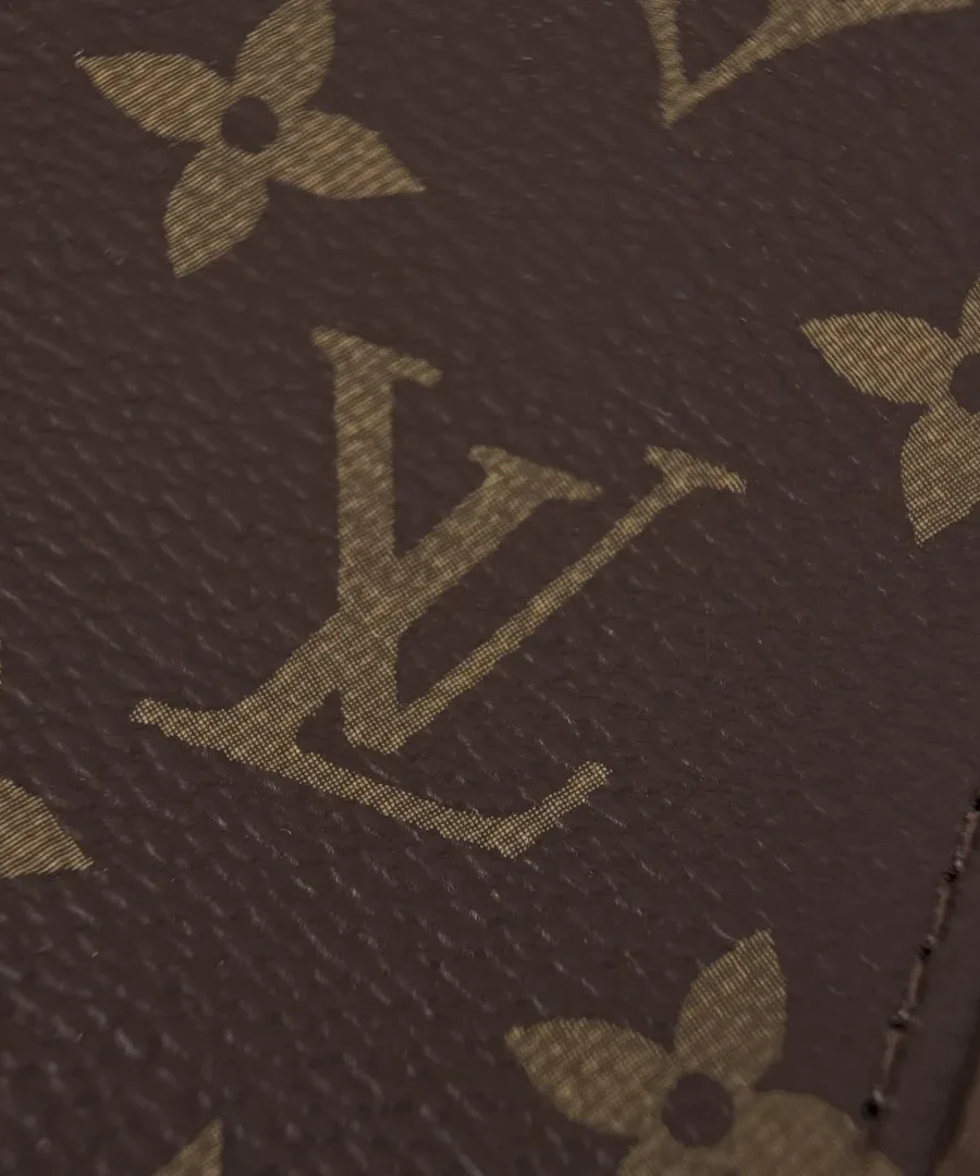 Крупный план текстуры канвы Monogram со швом