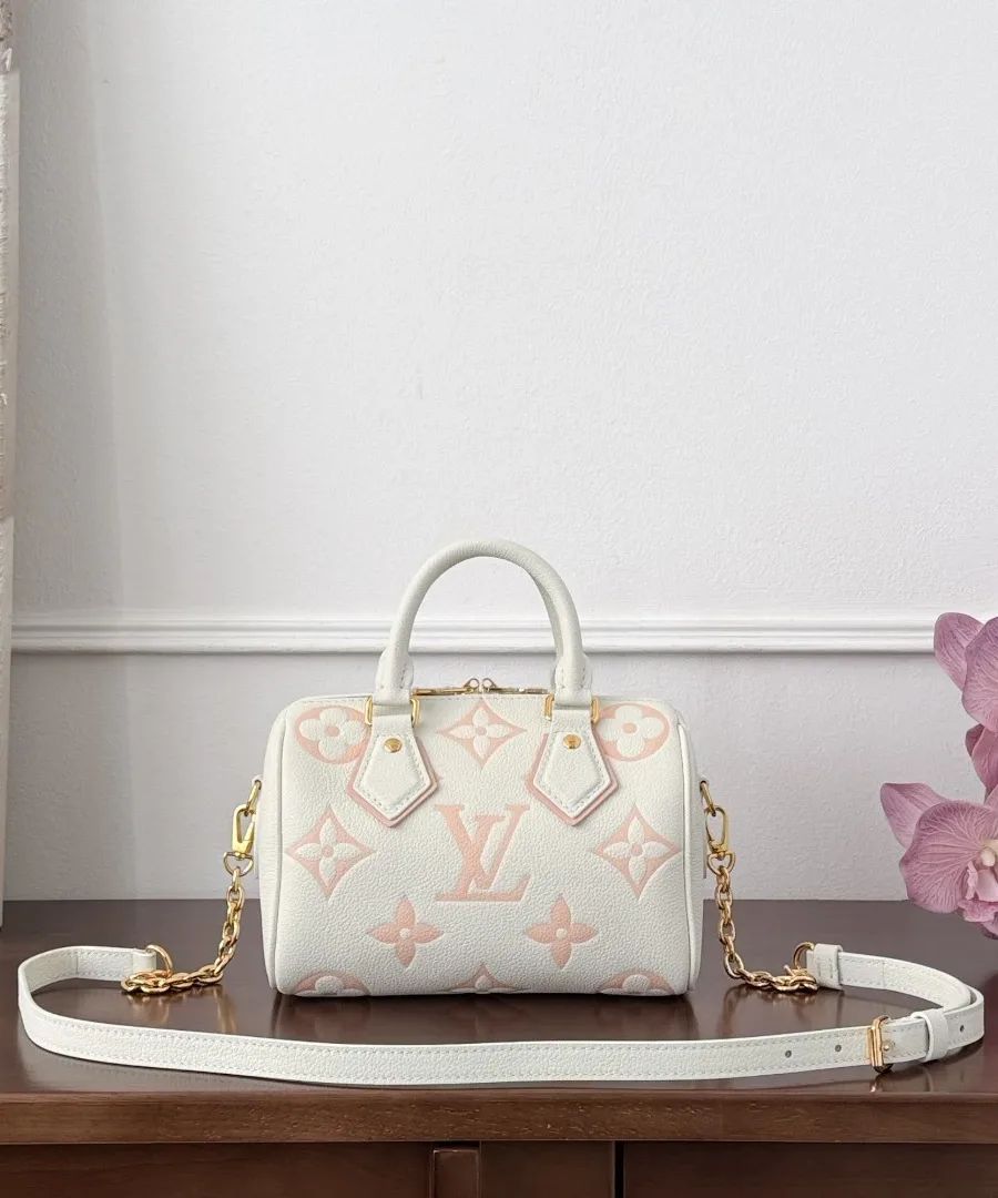 Белая сумка Speedy 20 с розовым узором Monogram и плечевым ремнем, вид спереди