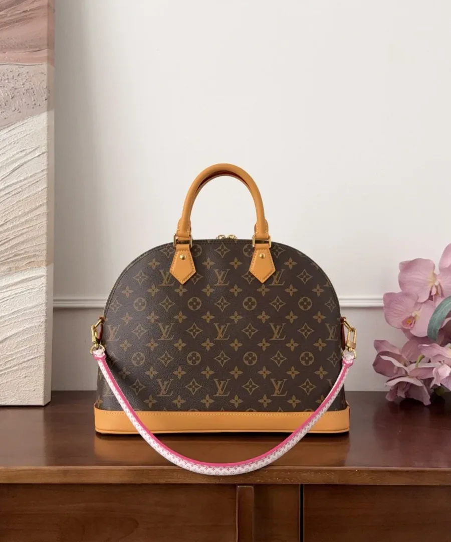 Сумка Louis Vuitton Alma Monogram с прикрепленным текстильным ремнем-шнуром