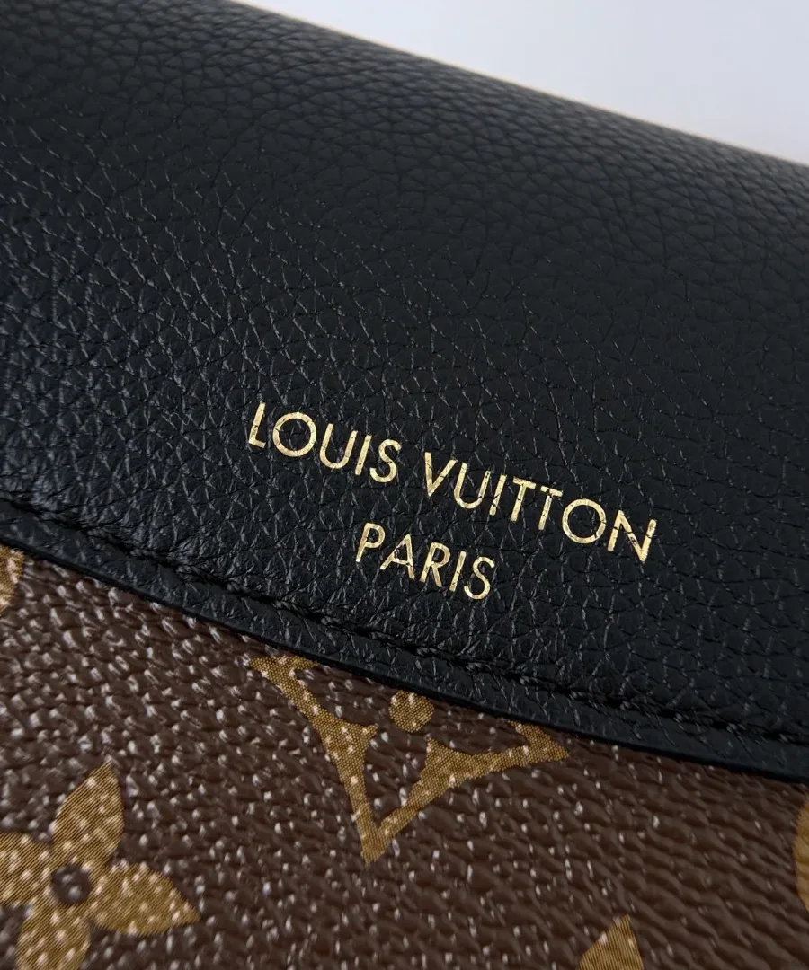 Тиснение Louis Vuitton Paris золотистым фольгированием на черном клапане