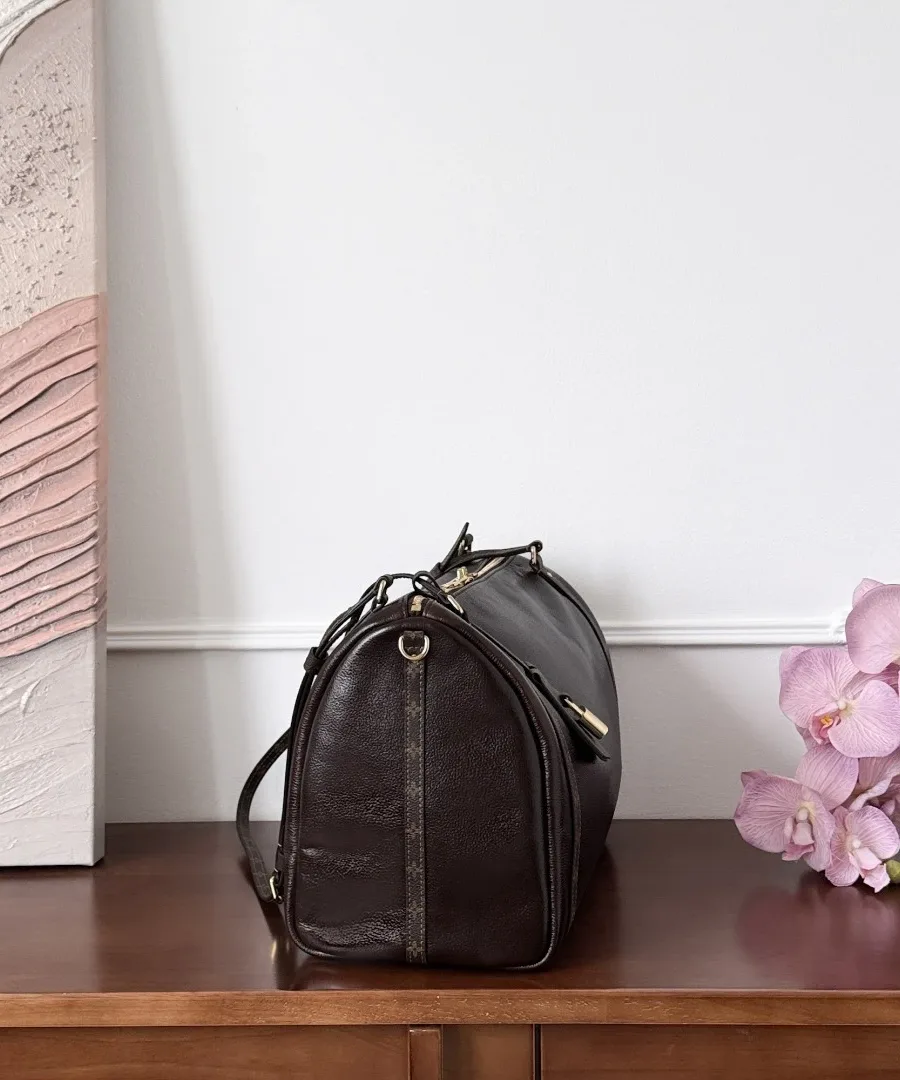 Кожаная сумка Louis Vuitton Express, вид сбоку