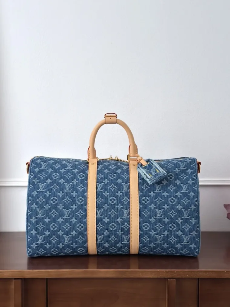 Louis Vuitton Голубая дорожная сумка Keepall 45 из денима