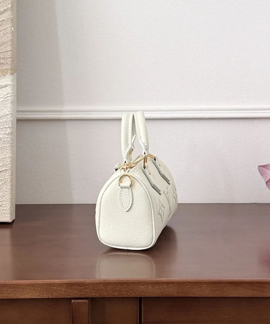 Бело-зеленая сумка Louis Vuitton Speedy Nano, вид сбоку