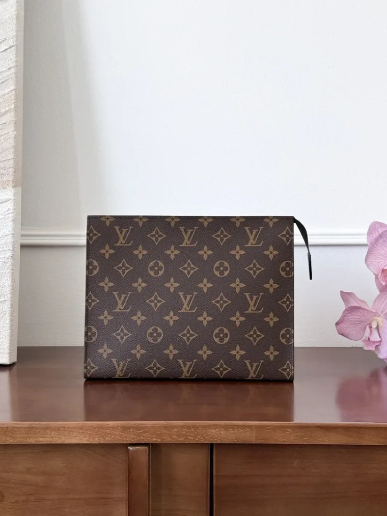 Louis Vuitton Коричневый клатч Toiletry Pouch с монограммой