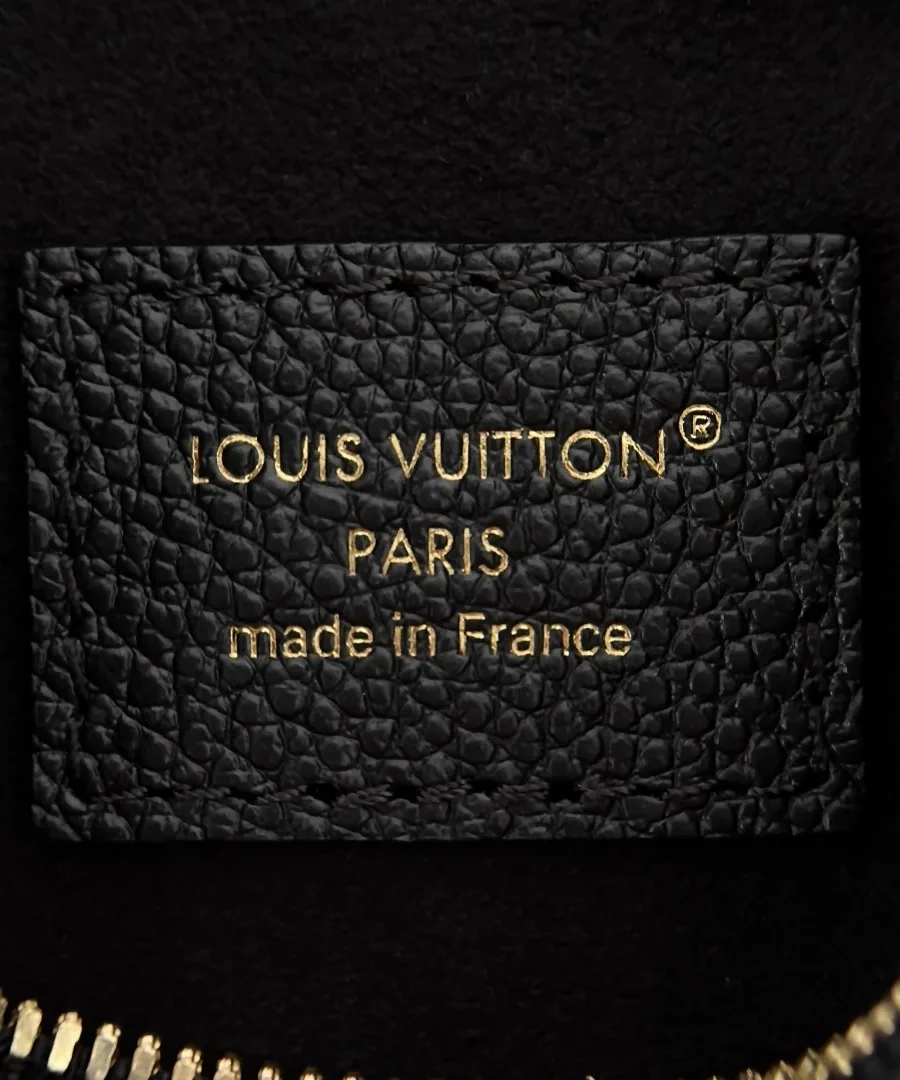 Кожаная нашивка с золотистым тиснением Louis Vuitton Paris made in France внутри сумки