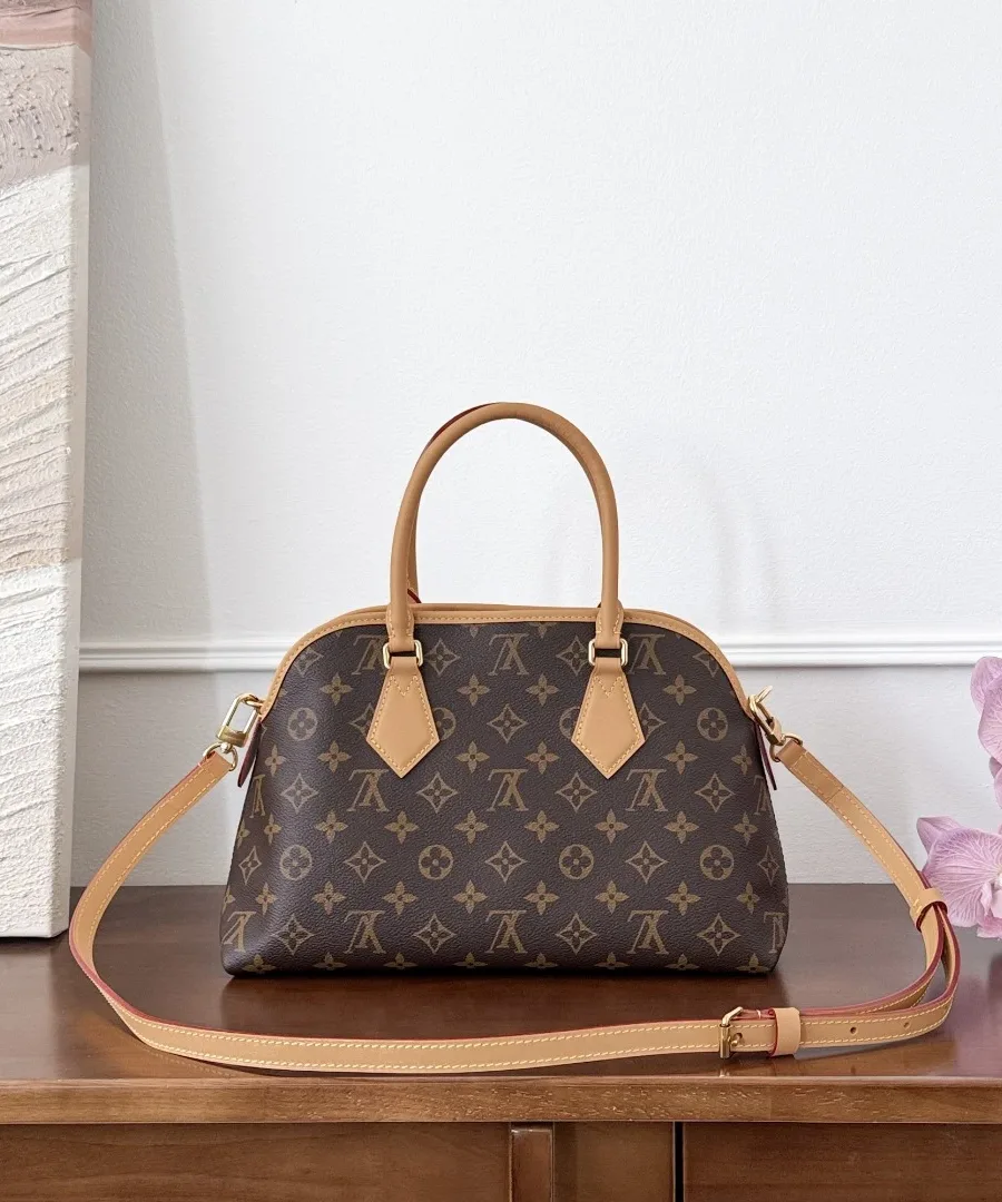 Сумка Louis Vuitton Evermore с прикрепленным плечевым ремнем