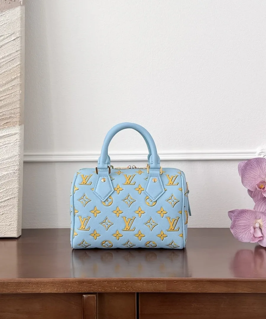 Голубая сумка Speedy 20 с желтым узором Monogram, вид спереди