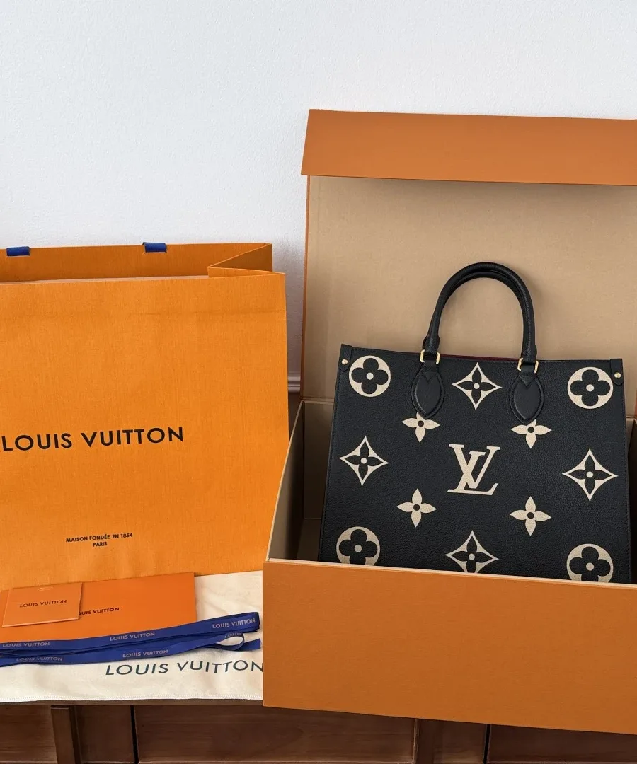 Сумка Louis Vuitton OnTheGo в фирменной оранжевой коробке с пакетом