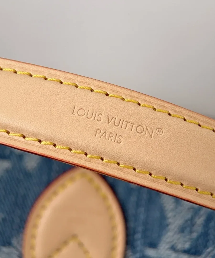 Тиснение Louis Vuitton Paris на кожаном ремешке крупным планом