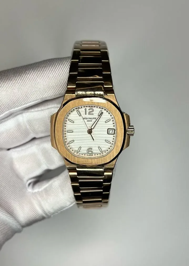 Patek Philippe Женские часы Nautilus с золотистым браслетом
